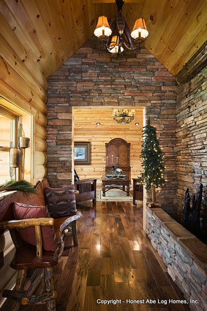 Interior, vertical, looking through hallway with water feature into den, Wilson residence, Crossville, Tennessee; Honest Abe Log Homes