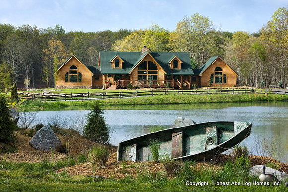 Exteror, horizontal, front scene setter with row boat and pond in foreground, Wilson residence, Crossville, Tennessee; Honest Abe Log Homes