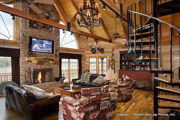 Interior, horizontal, living room toward fireplace and circular stairway, DeSocio residence, Henry, Tennessee, Honest Abe Log Homes