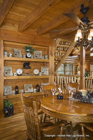 Interior, vertical, dining room vignette with built in display shelves, Alderson residence, Clinton, Arkansas, Honest Abe Log Homes