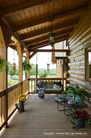 Exterior, vertical, porch swing, Swift residence, Honest Abe Log Homes, Allgood, TN