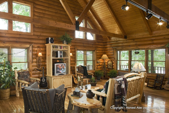Interior, horizontal, living room looking out windows, Alderson residence, Clinton, Arkansas, Honest Abe Log Homes