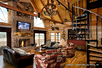 Interior, horizontal, living room toward fireplace and circular stairway, DeSocio residence, Henry, Tennessee, Honest Abe Log Homes