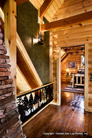 Interior, vertical, looking into guest bedroom from hallway, Wilson residence, Crossville, Tennessee; Honest Abe Log Homes