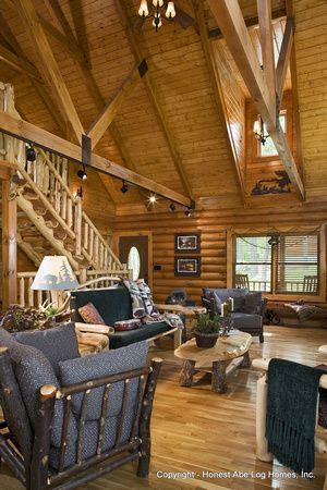 Interior, vertical, living room toward entry, loft and stairway, Alderson residence, Clinton, Arkansas, Honest Abe Log Homes