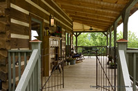 Exterior, horizontal, front porch through gate, Gros residence, Honest Abe Log Homes, Murfreesboro, TN