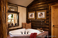 Interior, horizontal, master bathroom tub vignette, Wilson residence, Crossville, Tennessee; Honest Abe Log Homes