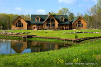Exterior, horizontal, front elevation overall with pond in foreground, Wilson residence, Crossville, Tennessee; Honest Abe Log Homes