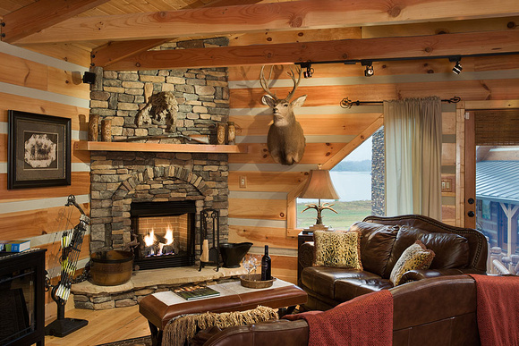 Interior, horizontal, game room sitting area toward fireplace, DeSocio residence, Paris, Tennessee; Honest Abe Log Homes