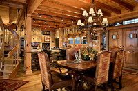 Interior, horizontal, dining room toward kitchen with circular stairway on left, DeSocio residence, Paris, Tennessee; Honest Abe Log Homes